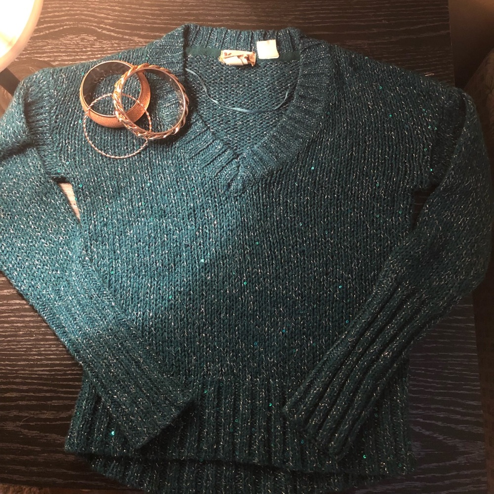 Shiny and green sweater